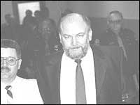 Richard Kuklinski enters court